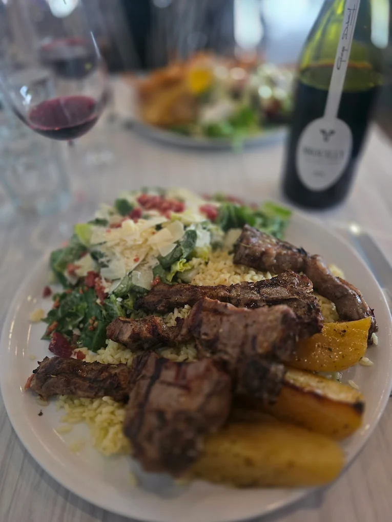 Lamb chops with rice and Greek salad