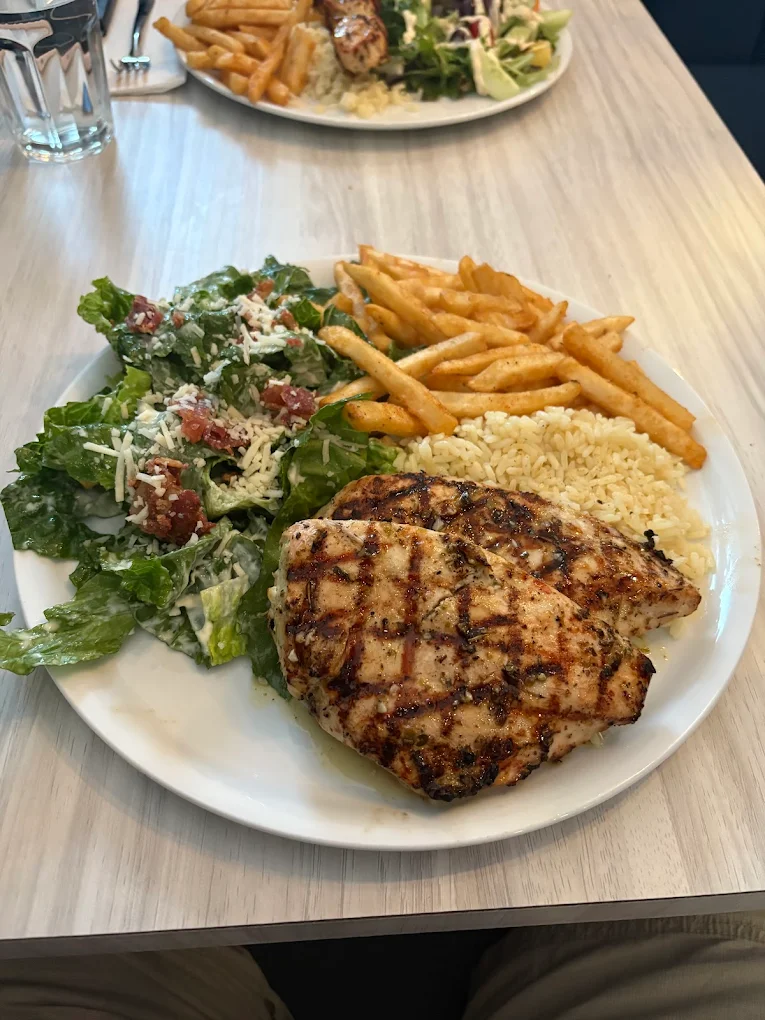 Grilled shrimp platter with fries and salad
