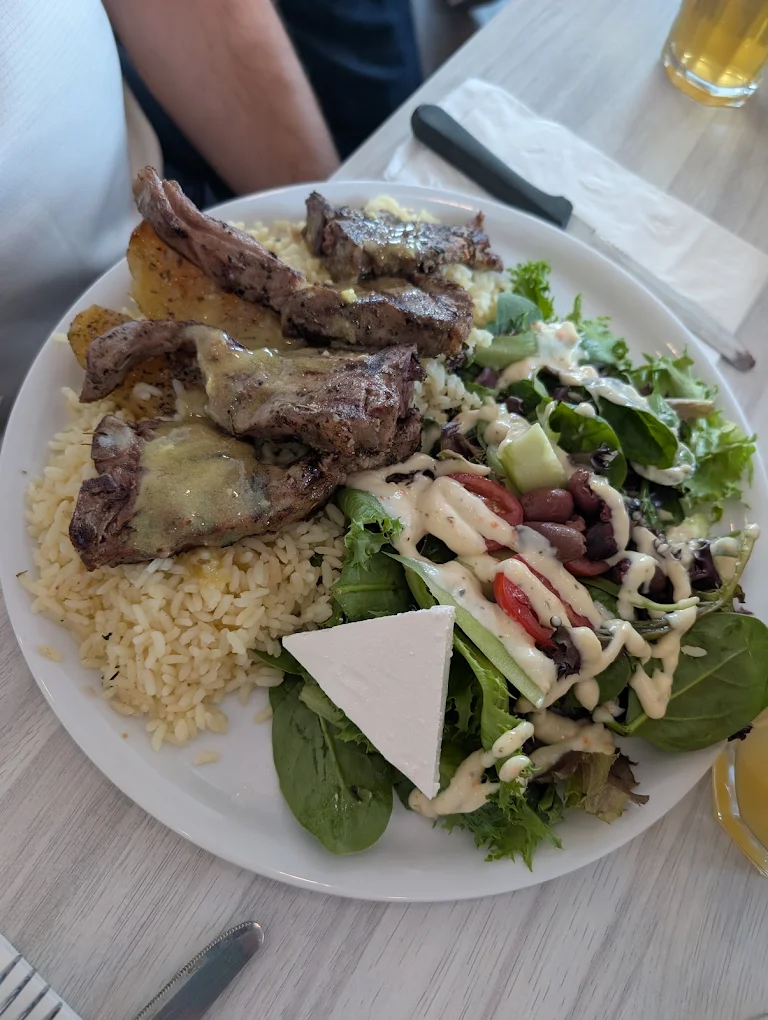 Fried fish and shrimp with rice and Greek salad